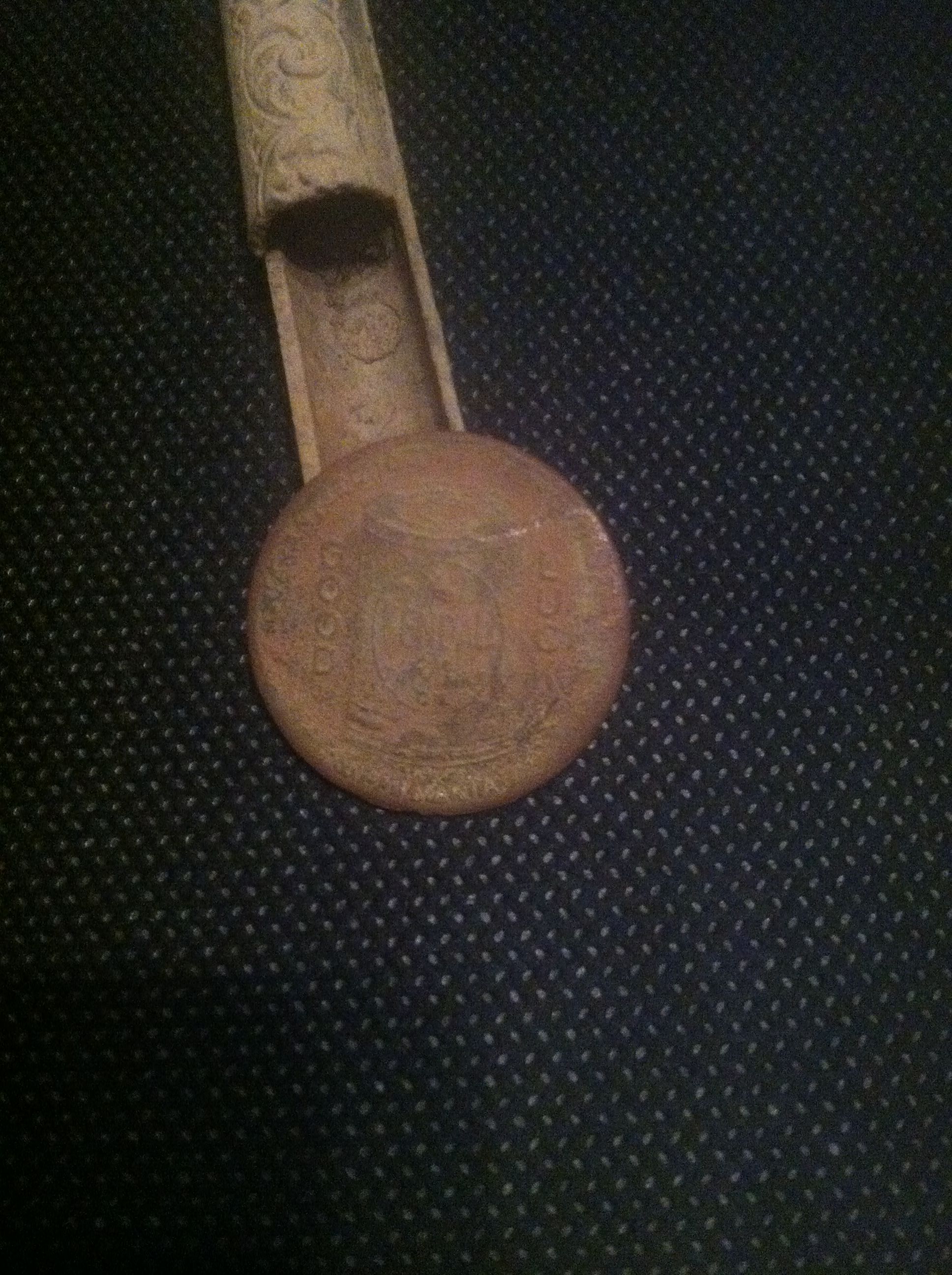 Kendall motor oil token. As far as I can tell its from about 1910, I'll update that if I find a different date. It says Good Luck on one side, and a m