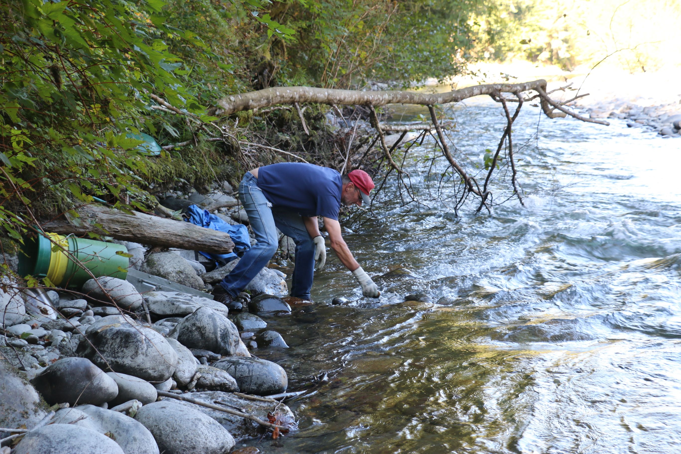 My buddy building a spot to place his sluice box.