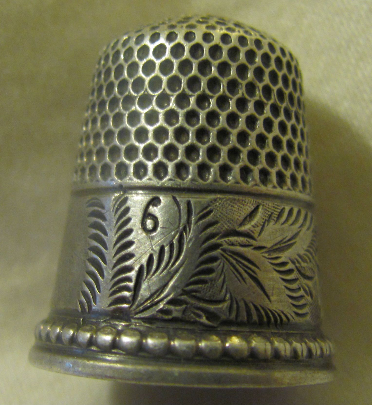 My first ever silver thimble, size 6. 
10/2012