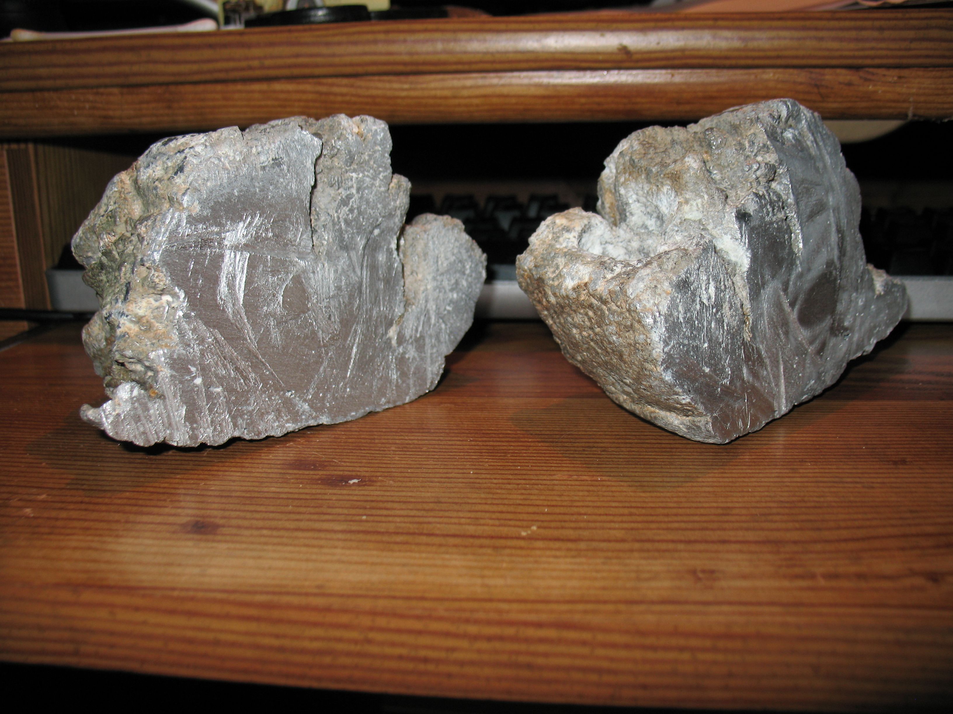 Same rock, but cut in half, albeit very badly. I will eventually grind and polish the surface.