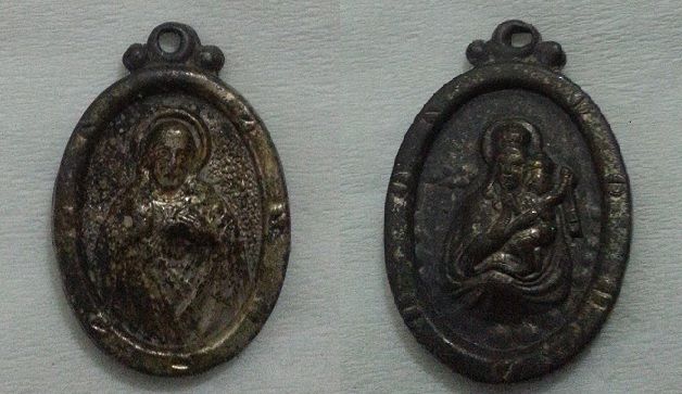 Some sort of religious pendant, not precious metal