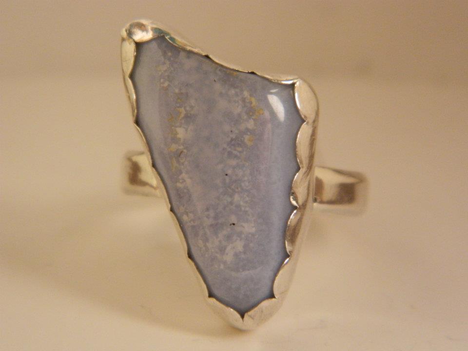 Sterling silver ring with unknown stone.
