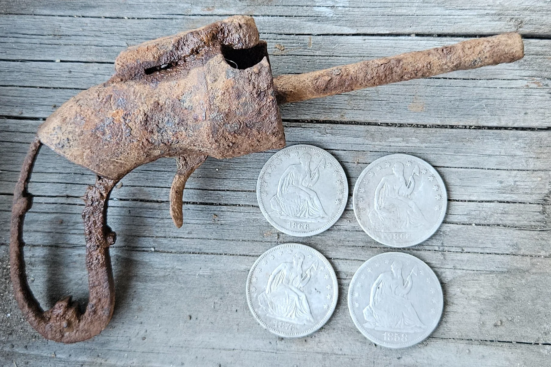 rev gun and coins.webp