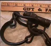 slave cuffs child.webp