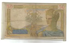 1939 Fifty Franc currency in plastic sleeve reverse.webp