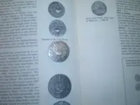 old coin found on beach.webp