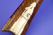 rifle_butt_profile_closeup_480.webp