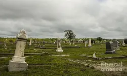 leaning-tombstones-galena-kansas-cemetery-deborah-smolinske.webp