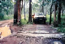 Corrugated_road_in_wet_season._CYP_1990.webp