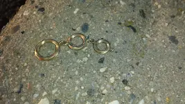 three rings gold.webp