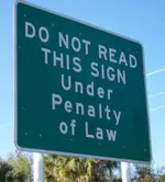 do_not_read_this_sign_under_penalty_of_law.webp