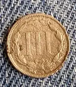 3 cent rev.webp