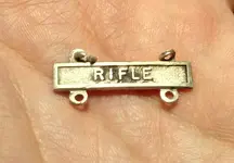 WWII Rifle Pin Front.webp WWII Rifle Pin Front.webp