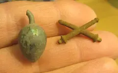 Copper fruit and crossed cannons.webp Copper fruit and crossed cannons.webp