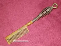 antique_kentucky_maid_no_5_hair_pressing_comb_brass_iron_steel_coiled_handle_1_lgw.webp