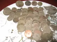 oct 23rd 74 half, 41 wheatie,token, bicen qtr 73 coins sorted.webp