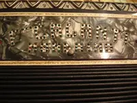 Accordian Name Plate.webp