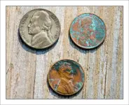 three-coins-web.webp
