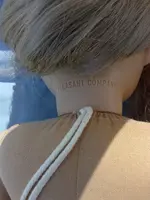 american girl blonde back neck.webp