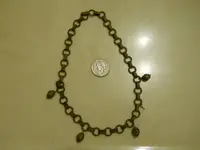 nicklace from yard.webp
