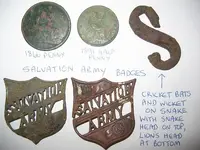 salvo badges and coins.webp