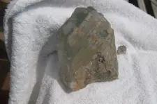 Green tint rock and clear crystal 004.webp