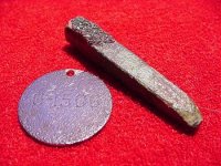 silver tag and brass spike.JPG