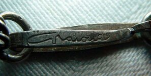 Unknown Silver Necklace Sign (800x405).jpg