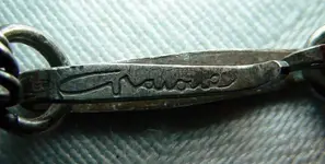 Unknown Silver Necklace Sign (800x405).webp