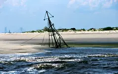 sunken-shrimp-boat-being-swallowed-by-the-sand-by-troup-nightingale-album-in-comments-50170.webp