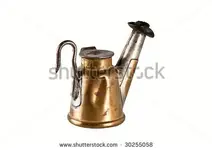 stock-photo-antique-teapot-miners-lamp-isolated-30255058.webp