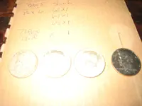 Three keepers and a game token 001.webp