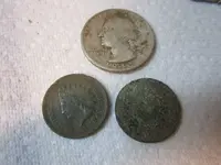 Two Indian head pennies 001.webp