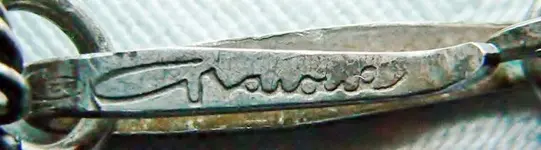 Unknown Silver Necklace Sign (800x405).webp