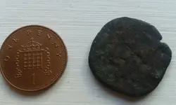 reverse roman coin.webp