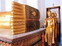 32878150-the-feet-view-of-recline-buddha-statue-display-the-universe-in-thai-ancient-culture-...webp