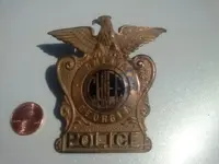 Badge (Front).webp
