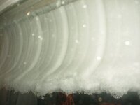 2012.02.21 Roof Snow Curling Under Itself.jpg
