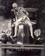 gal on the hood.webp
