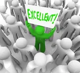 16515468-A-man-holds-a-sign-with-the-word-Excellent-to-stand-out-as-unique-and-different-as-t...webp