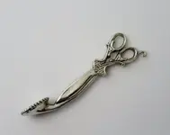scissors snuffer.webp