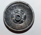May 6 16 NY COP button back.webp