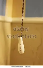 an-old-fashioned-pull-chain-flusher-for-an-old-toilet-dbcj2m.webp