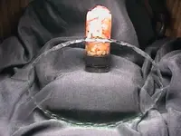 Hand chipped oval shaving mirror.webp