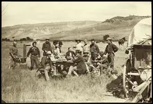 WH_Jackson-Personnel_of_the_expedition_of_1870_in_camp_at_Red_Buttes_Wyoming.webp
