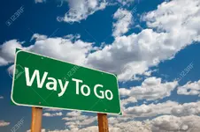 Way-To-Go-Green-Road-Signck-Photo.webp