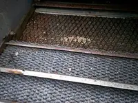 under with righteous ripped carpet.webp