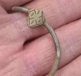 silver brooch fragment.webp