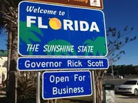1390307764000-blue-fl-welcome-sign.webp
