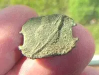 InterestingUnknownJewelrypiece.webp
